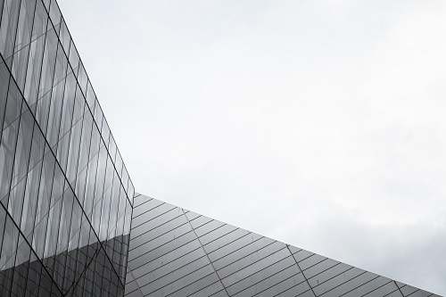office building gray metal and glass building city